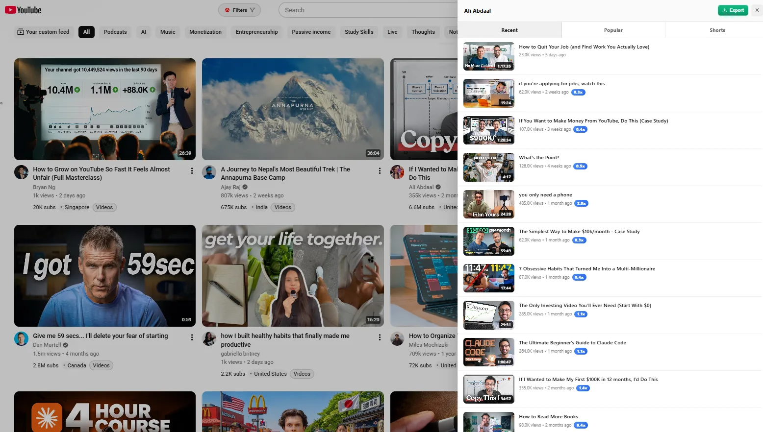 TubeGrade extension on the YouTube home feed with outlier and subscriber badges on video cards, a Filters button and Shorts hidden.